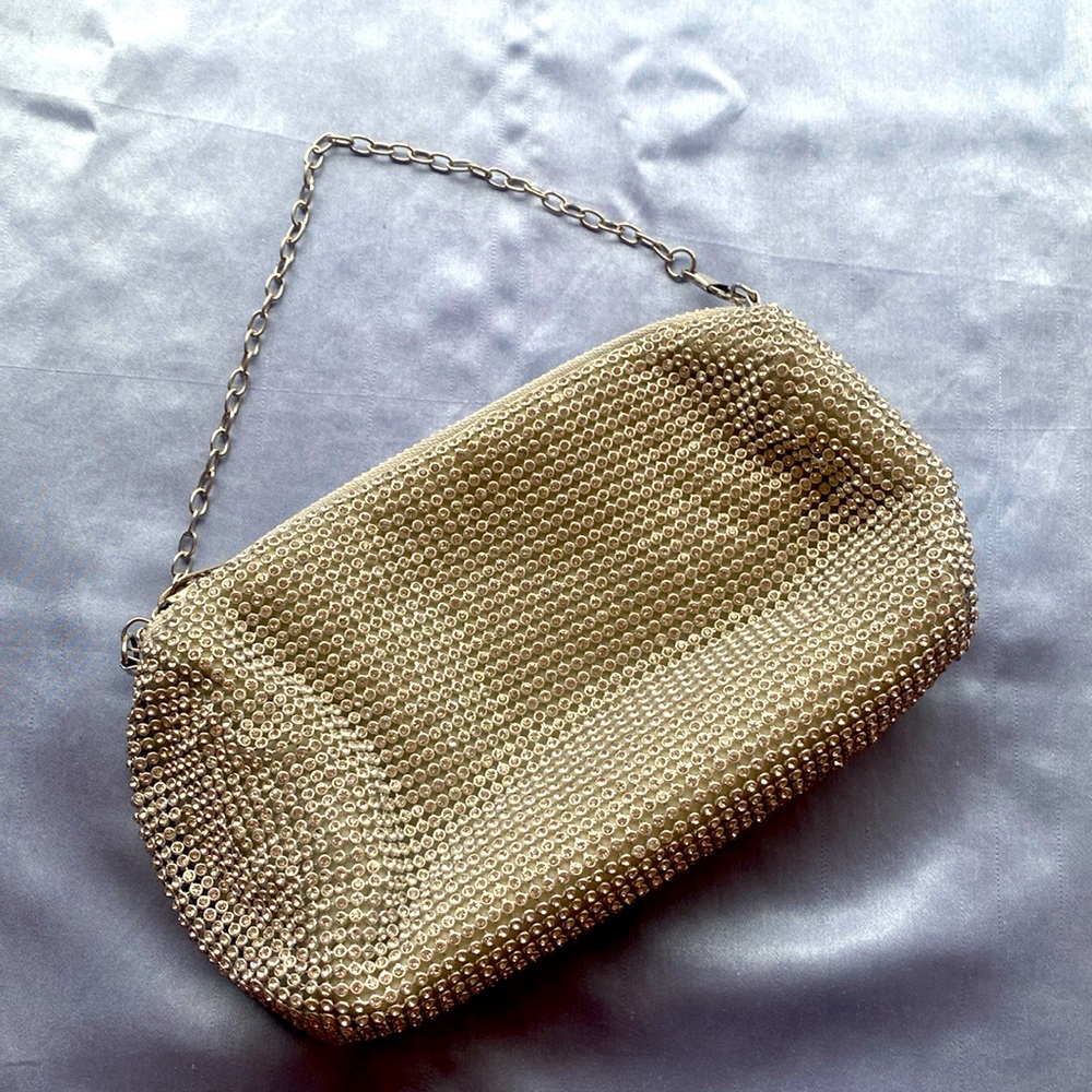 Silver sequined clutch